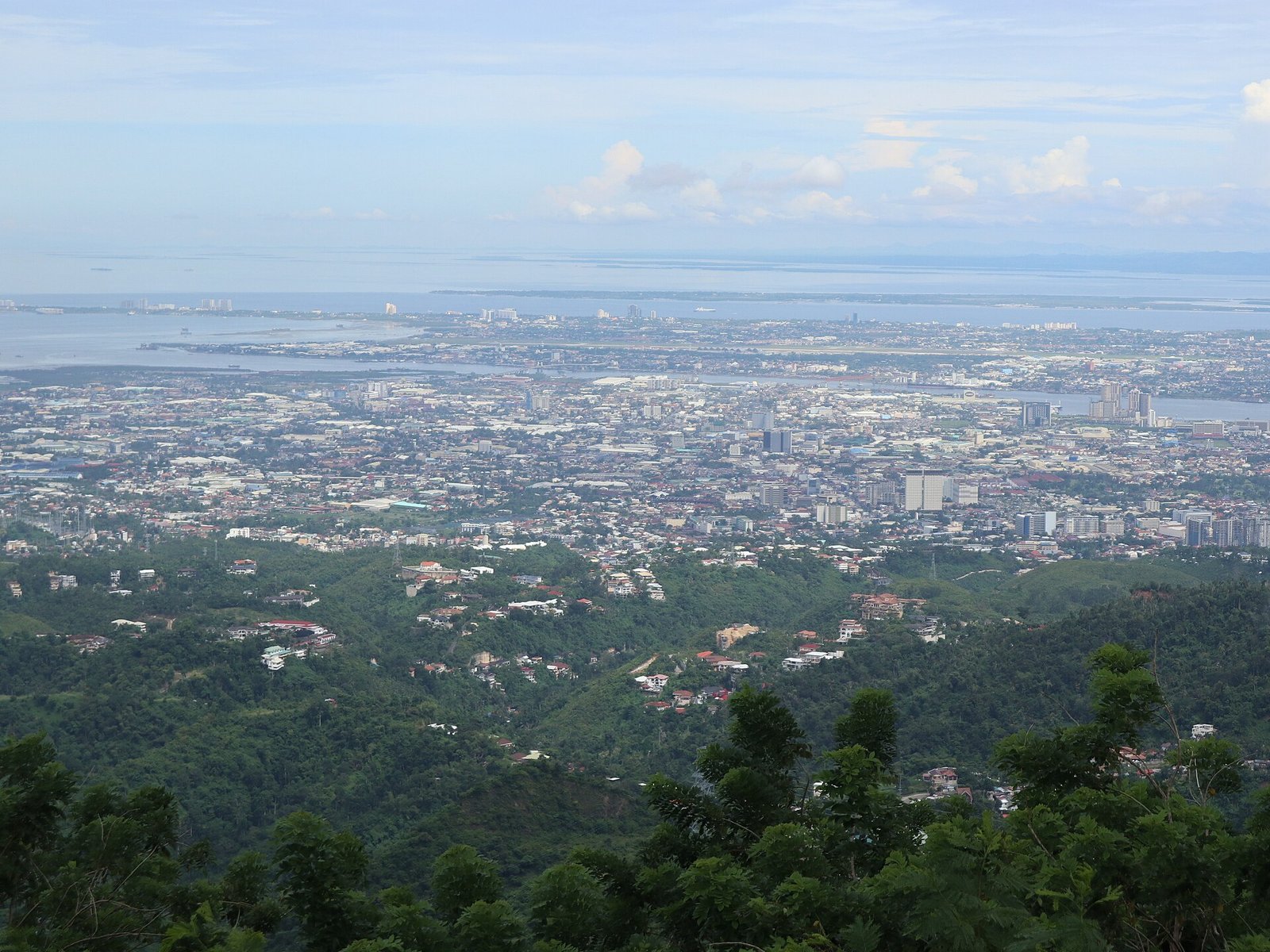 Mandaue City at the centre of Metro Cebu, with Mactan Island beyond